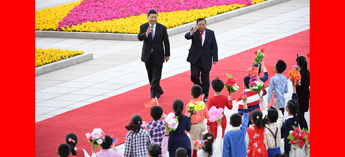 习近平举行仪式欢迎老挝人民革命党中央总书记 国家主席访华